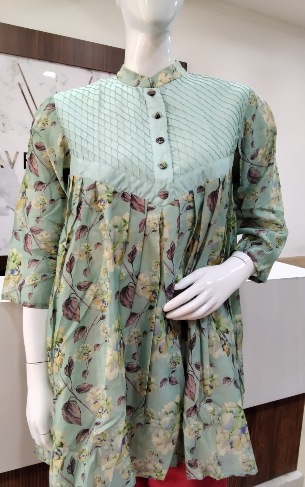 Gathered and pintext designed top with print