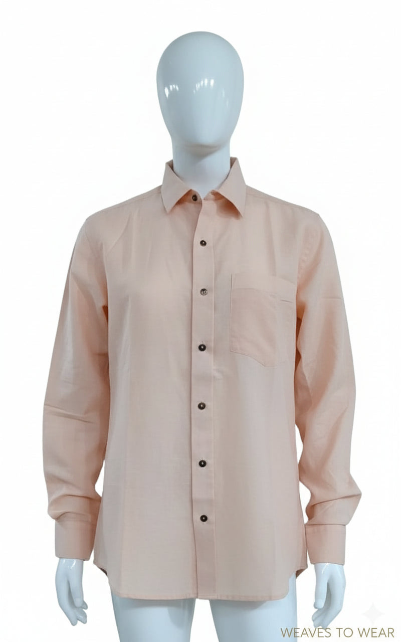 Peach shirt on a mannequin with a white background
